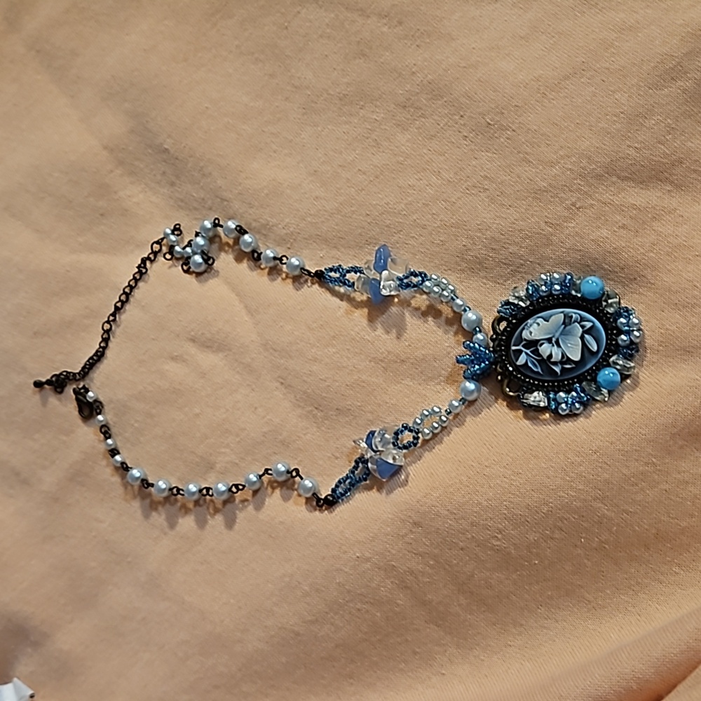 Homemade butterfly cameo necklace